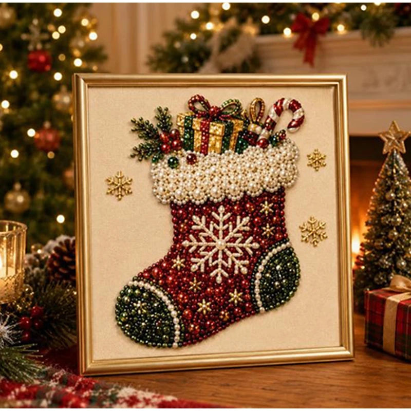A framed picture of a Christmas stocking made with red and green sequins and pearls on a gold background.