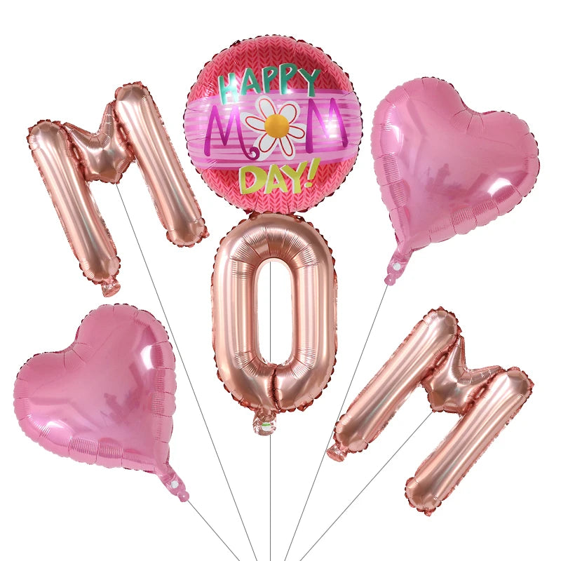 A set of six pink foil balloons including a heart, a number zero, and a balloon with the words Happy Mother's Day.