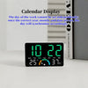 A digital calendar display showing the date and day of the week, along with temperature and humidity readings.