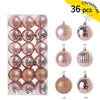 A set of 36 festive pink and gold Christmas baubles for holiday tree and decor.