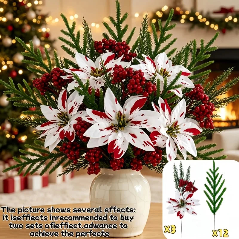 A festive bouquet of red and white artificial flowers and greenery displayed in a white vase.