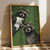 A framed canvas print featuring two gray-furred pandas looking directly at the viewer against a green background.