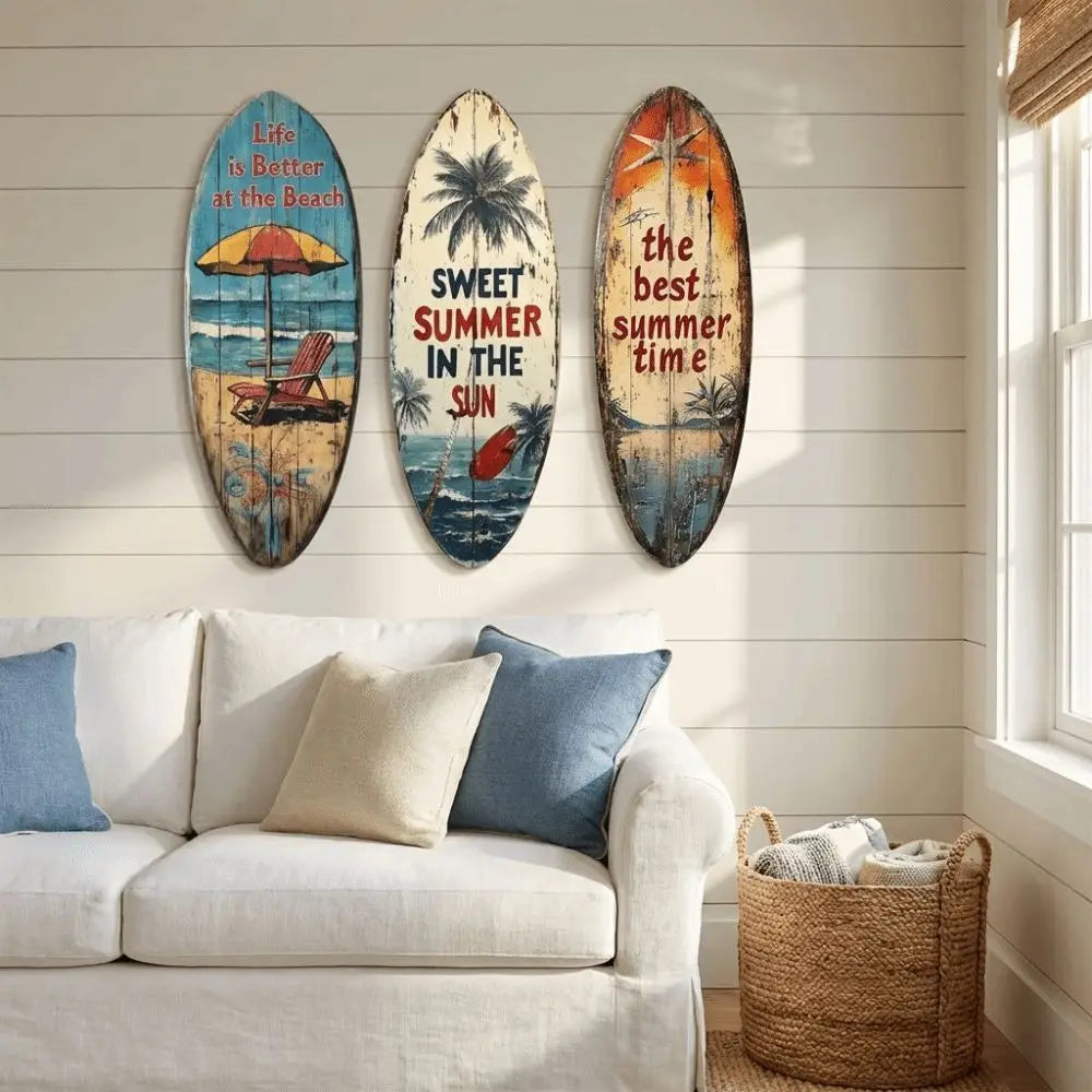 Three oval wooden surfboard wall art pieces featuring tropical scenes and summer themes