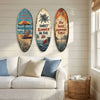 Three oval wooden surfboard wall art pieces featuring tropical scenes and summer themes