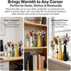 A display of whimsical resin cat flower vases in various colors on wooden shelves and a desk.