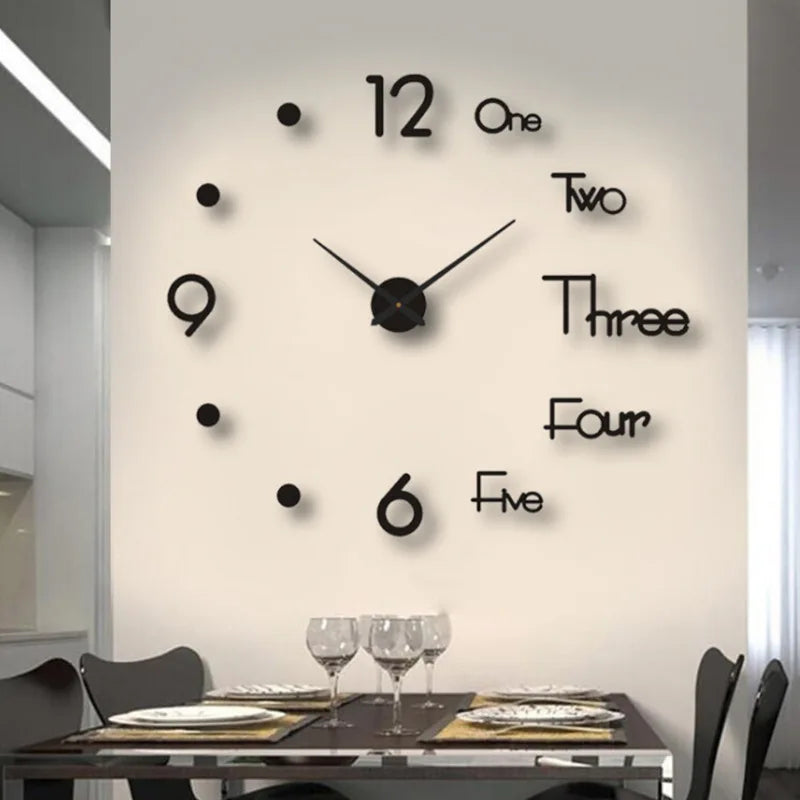 A modern wall clock with black numbers and hands is mounted on a white wall above a dining table.