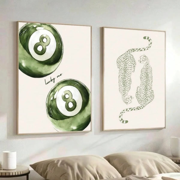 A set of two canvas prints featuring a sage green cheetah and pool ball design on white backgrounds.