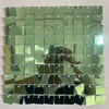 A grid of iridescent sequin shimmer wall panels reflecting light and various colors.