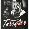 A black and white movie poster featuring a menacing clown mask and a hand holding a knife, with the title Terrifier prominent