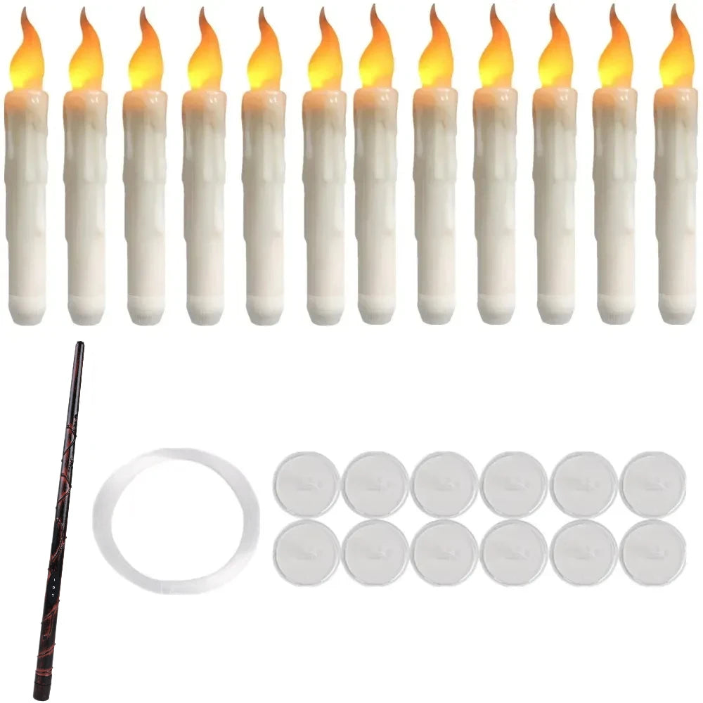 A set of white flameless floating candles and a magic wand remote control.