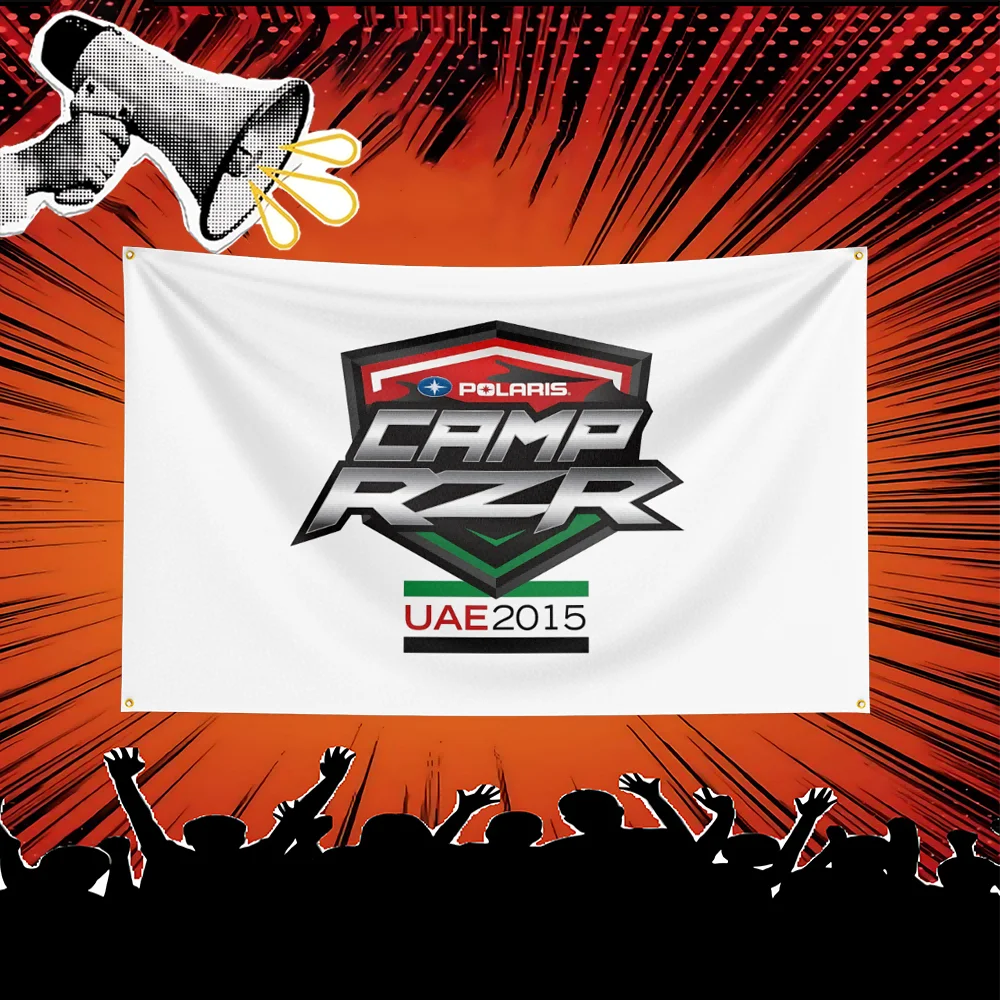 A white banner featuring the Polaris Camp RZR logo and UAE 2015 text against a red, starburst background.