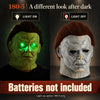 A split image showing a green glowing mask and a gray mask, demonstrating light on and off features.