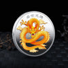 A round collectible coin featuring a golden dragon design against a silver background.