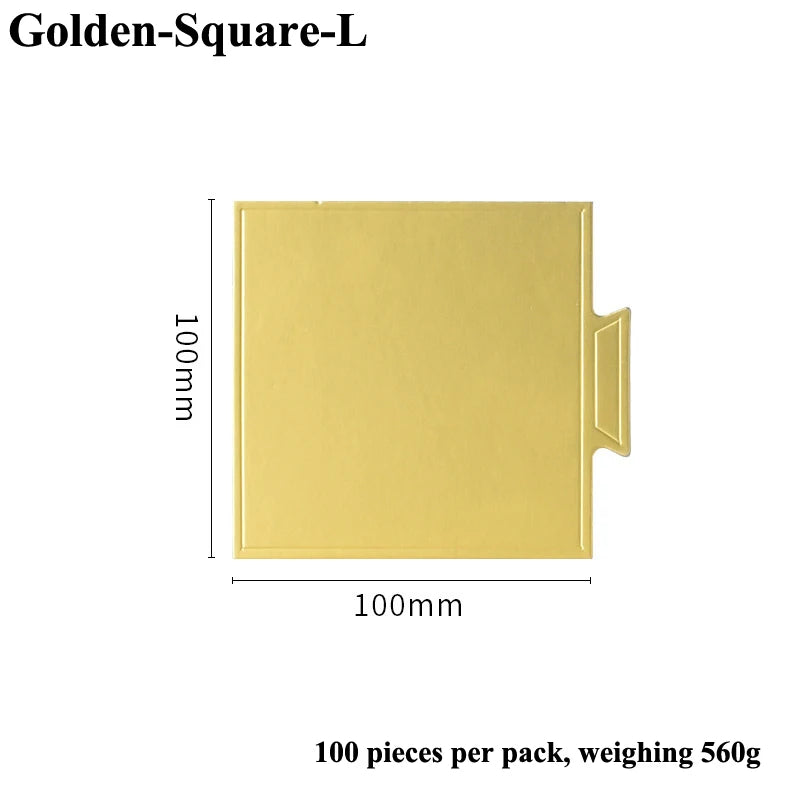 A rectangular metallic gold dessert cake board, 100mm by 100mm, with a small protrusion.