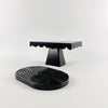 A set of two black cupcake stands with a flat top and pedestal base.