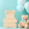 Panneau d'affichage de souvenirs en forme d'ours en bois pour le premier anniversaire, avec des sections numérotées de un à d