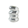 A spiral disco ball made of silver mosaic tiles used as a vase or pen holder.
