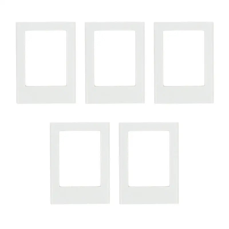 A set of five white decorative photo frame magnets arranged in a row.