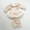 Vintage lace pajama set for a doll featuring satin fabric and delicate lace trim