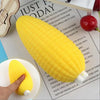 A yellow squishy food-shaped stress ball is shown next to a printed text on a white background.