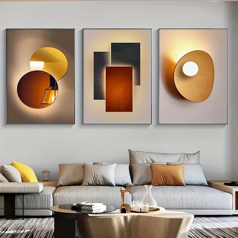 Three modern geometric canvas wall art pieces featuring abstract shapes in gold, bronze, and charcoal tones.