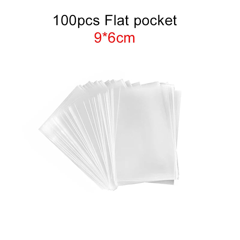A stack of 100 clear flat pockets for lollipop packaging, measuring 9x6cm.