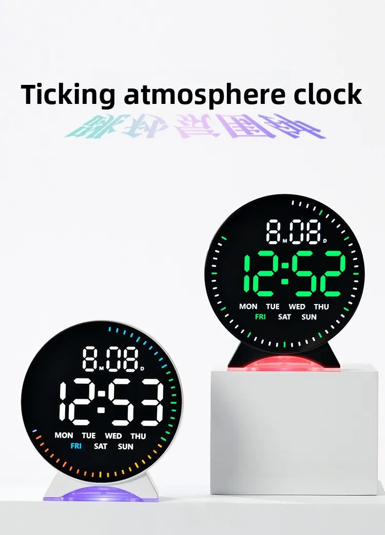 A black LED ambient light clock displaying 12:52 with a ticking atmosphere design.