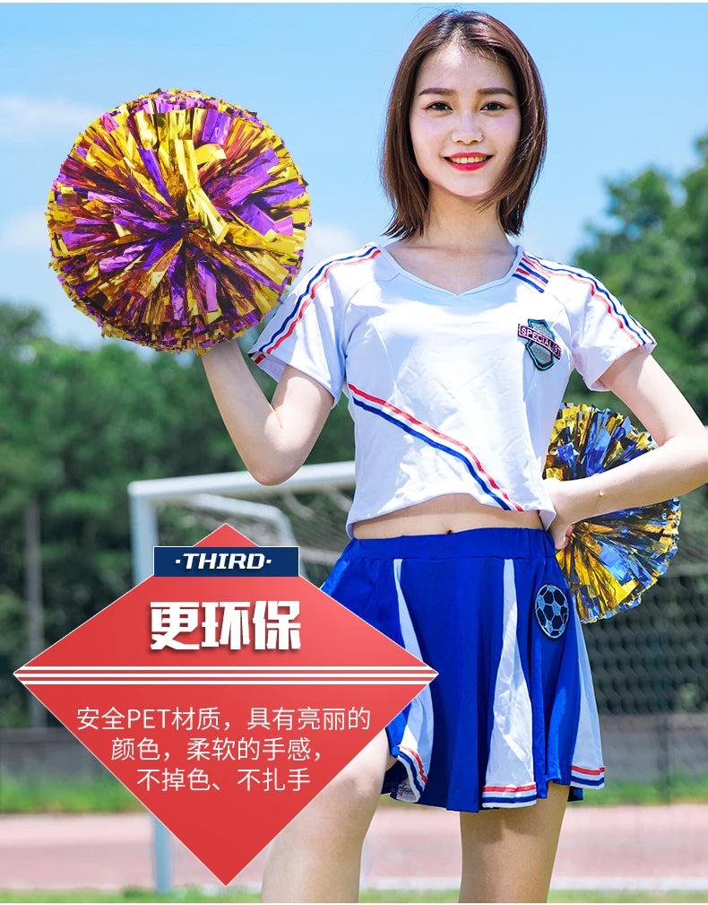 A young woman holds a vibrant purple and yellow pom pom while wearing a white athletic shirt and blue shorts.