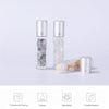 A set of ten 10ml refillable roll-on bottles containing semi-precious stone roller balls and a silver roller ball.