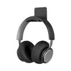 A black universal wall-mounted headphone holder and hanger.