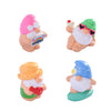 A set of three festive resin dwarf figurines featuring a pink-hatted figure, a green-hatted figure with sunglasses, and an or