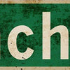 Vintage green metal sign with white text reading Pinche way