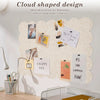 A scalloped felt bulletin board with a cloud-shaped design featuring various notes and decorations.
