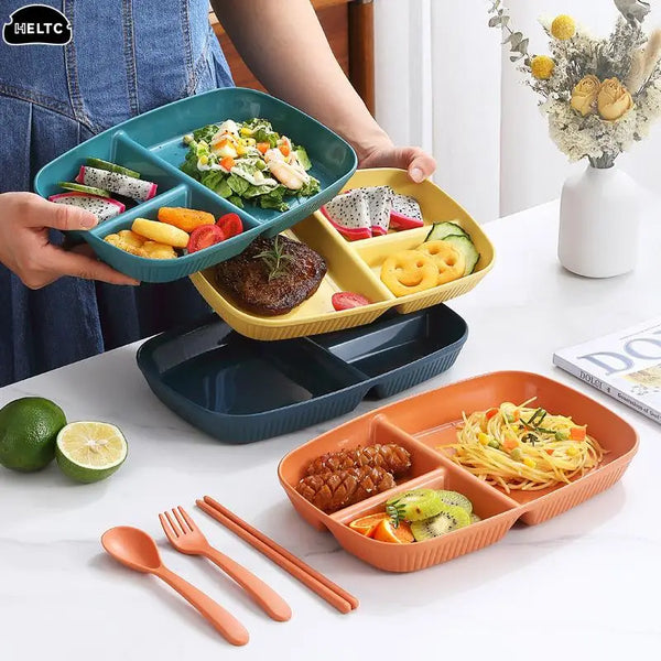 A set of colorful, multi-compartment portion control plates for balanced meals, including a green plate with salad and a yell