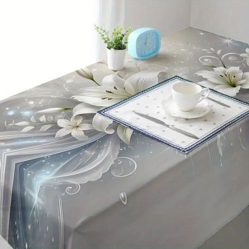 Elegant lily flower rectangular tablecloth set with a white teacup and blue clock