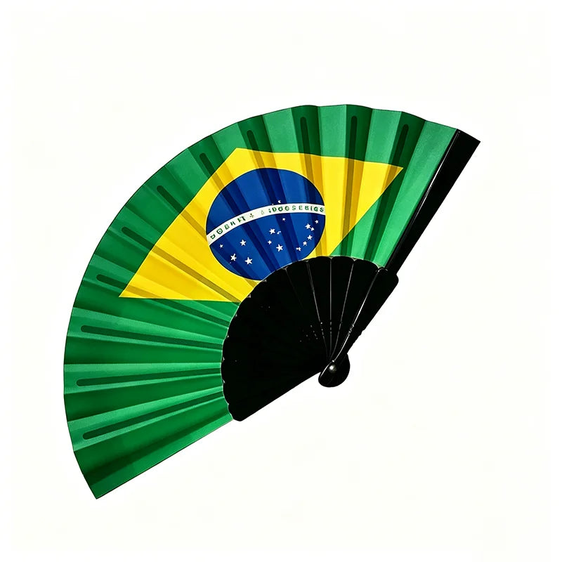 Handheld folding fan with a design featuring the Brazilian flag colors and stars.