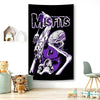 A black poster featuring the band name MISFITS in purple text with a skull design.