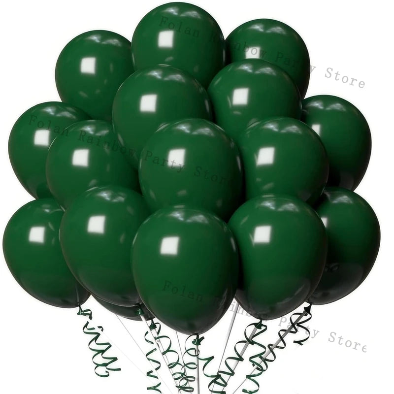 A bunch of matte green latex balloons with gold lettering and twisted ribbons.