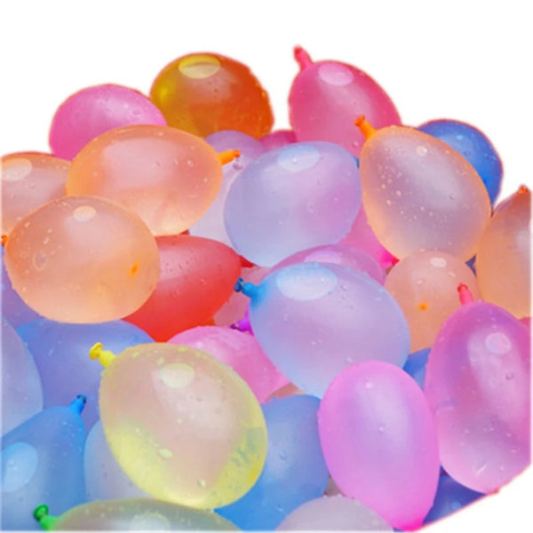 A close-up of colorful self-tying water balloons filled with water, showing various shades of pink, yellow, orange, and blue.