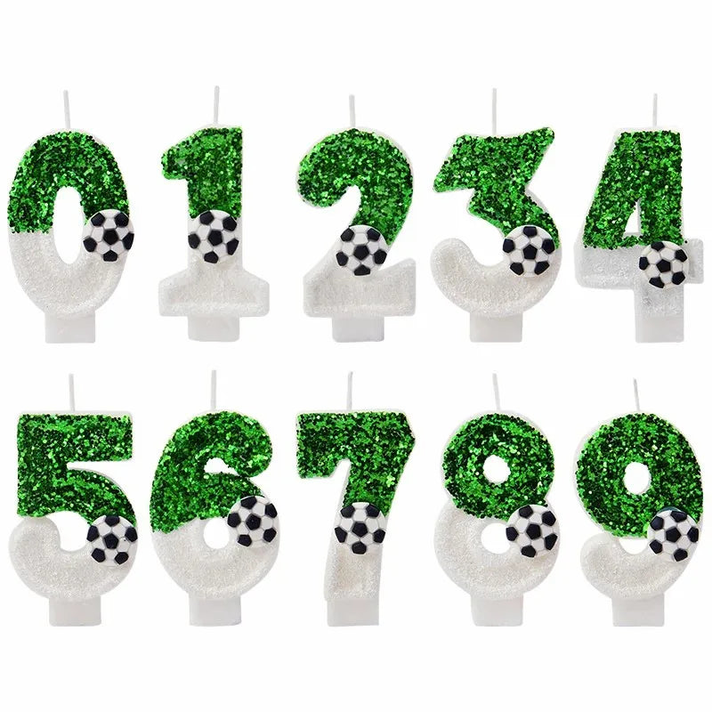 A set of green and white soccer-themed birthday candles shaped like the numbers one through seven.