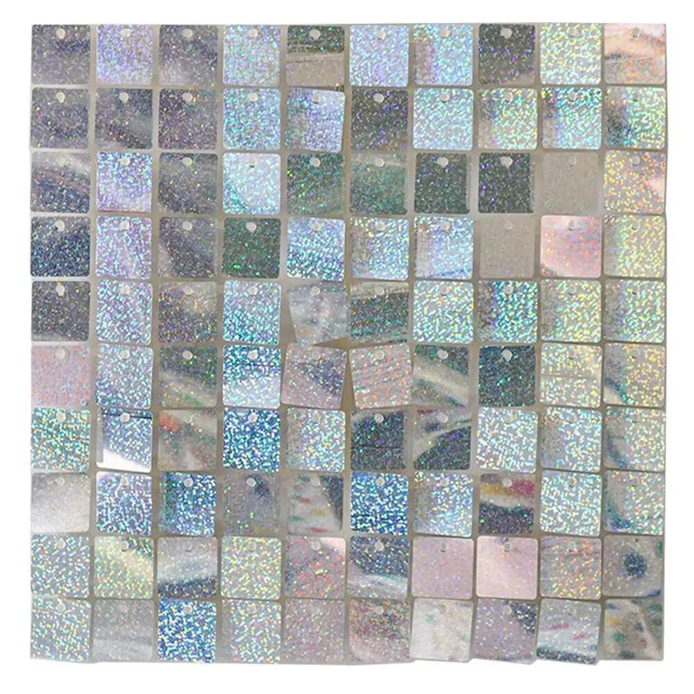 A grid of square panels featuring various shades of glitter and iridescent colors.