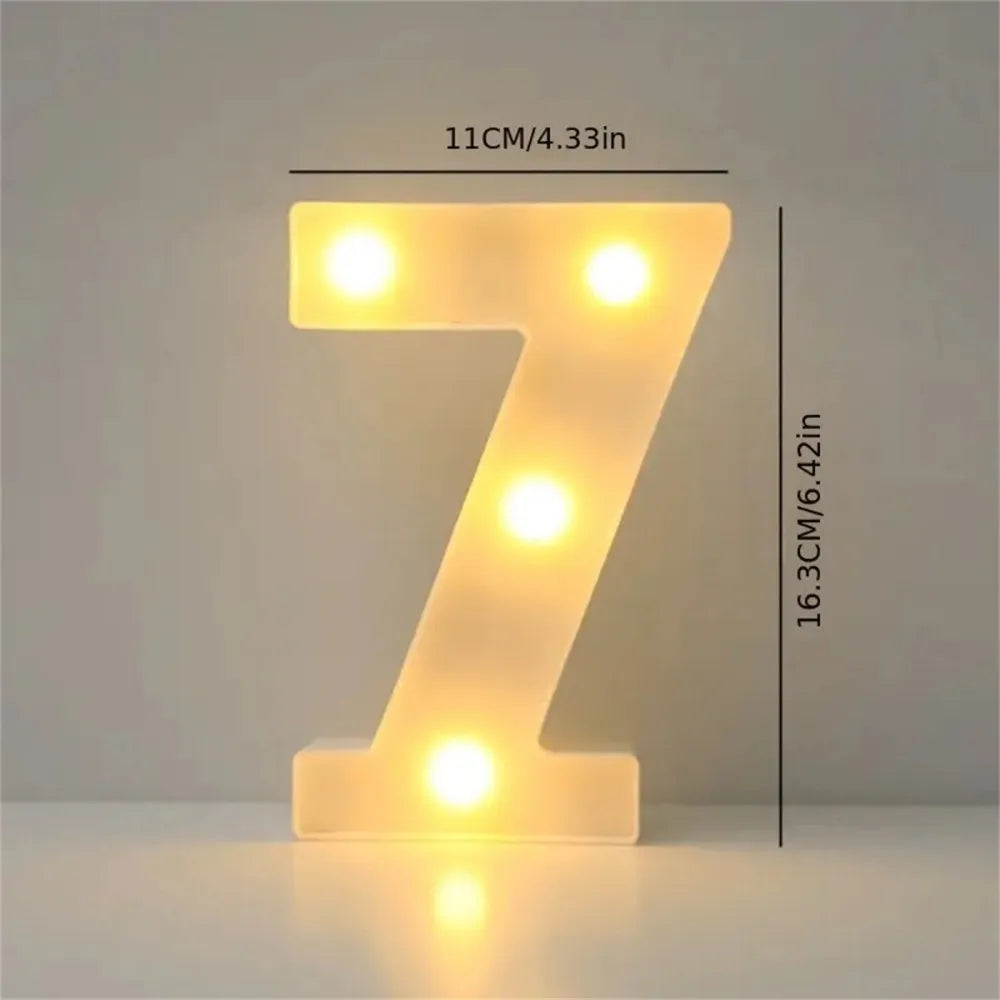 A glowing yellow LED letter light shaped like the number seven
