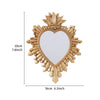 Golden flame sacred heart wall pendant with resin finish featuring a heart-shaped mirror design