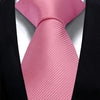 A pink silk necktie tied in a bow, displayed against a black suit jacket.