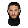 A realistic full-face cosplay mask for Halloween worn by a man with dark hair and a beard.