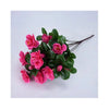 A cluster of artificial pink and magenta azalea flowers on green leaves for outdoor decoration