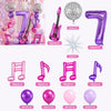 Purple music theme birthday party decorations including balloons, number balloons, and musical props