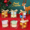A collection of clear PET favor boxes with ribbons and tags, containing various colored macarons and candies.