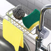 A faucet-mounted kitchen organizer with a drying rack holding a green sponge and yellow dishcloths.