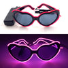 Pink and black heart-shaped LED wire party glasses with a black light glow
